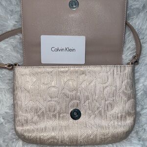 Calvin Klein - small clutch - beige color